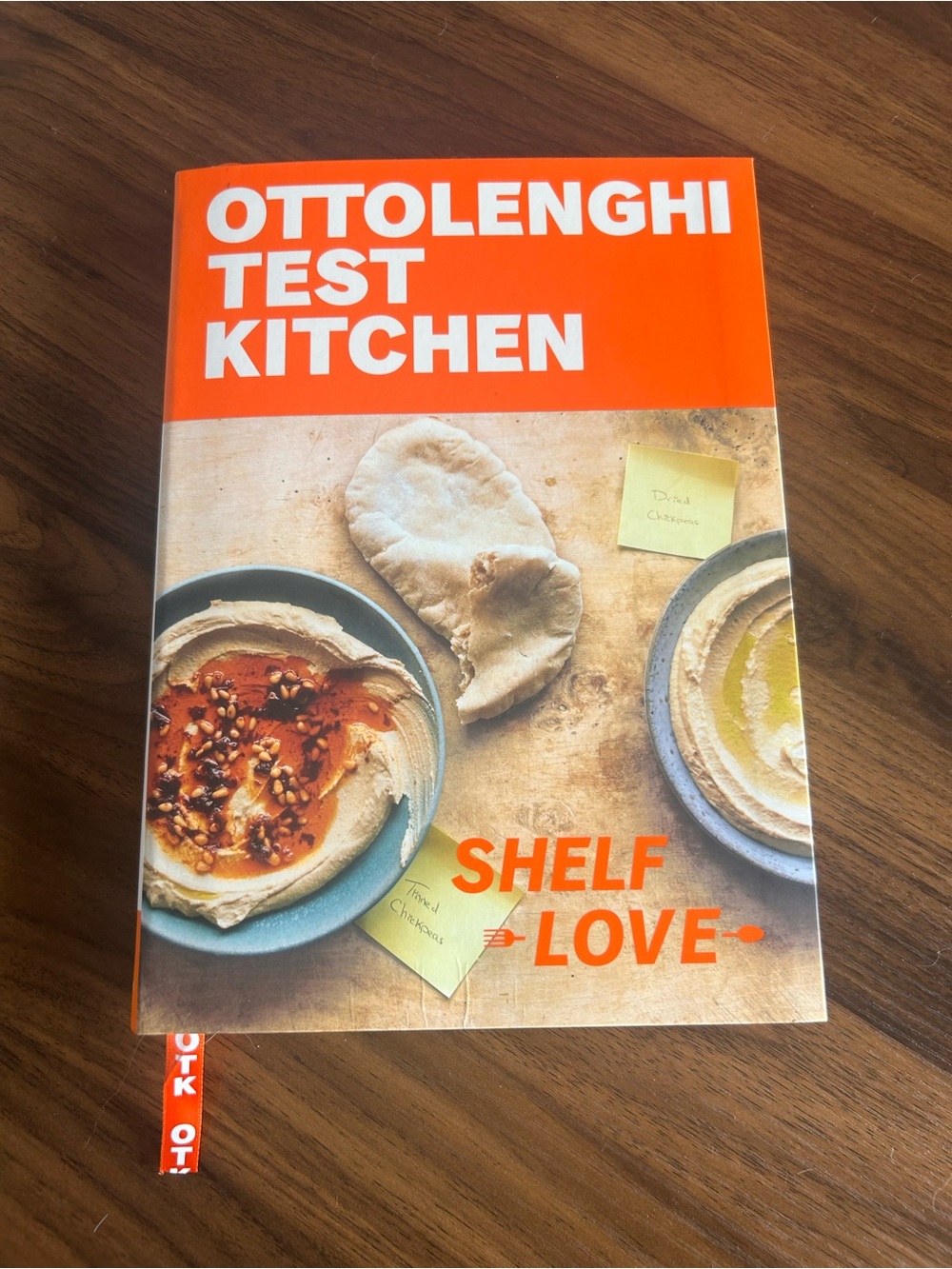 Test Kitchen Shelf Love Cookbook - Orange Cover
